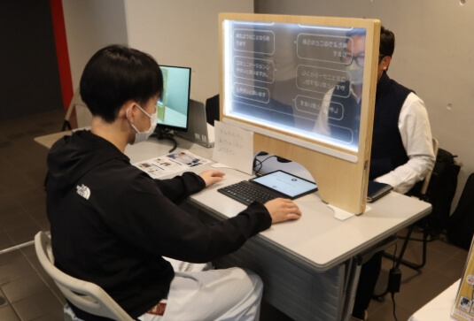 実証の様子（第6回JDKF.空手競技大会のデフリンピックで期待される新技術紹介コーナー）（撮影協力:東京武道館）